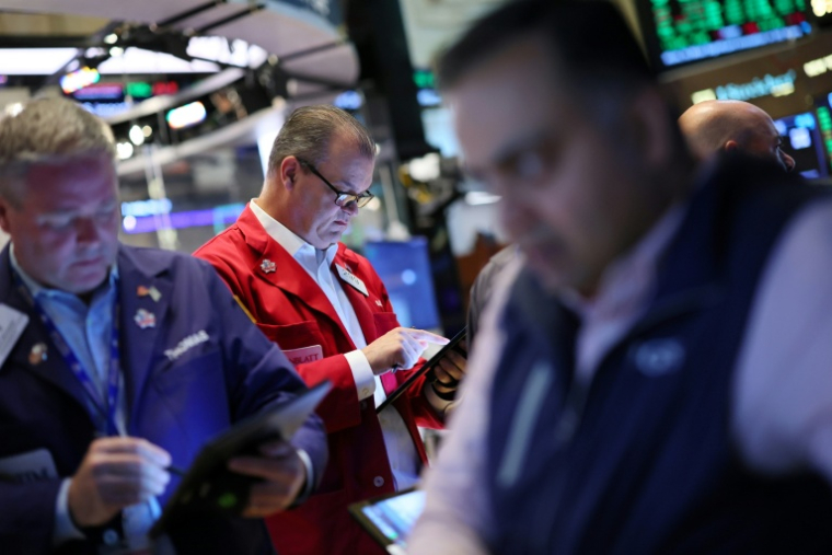 Traders, à l'ouverture sur le parquet du New York Stock Exchange le 12 mai 2025. ( GETTY IMAGES NORTH AMERICA / Michael M. Santiago )