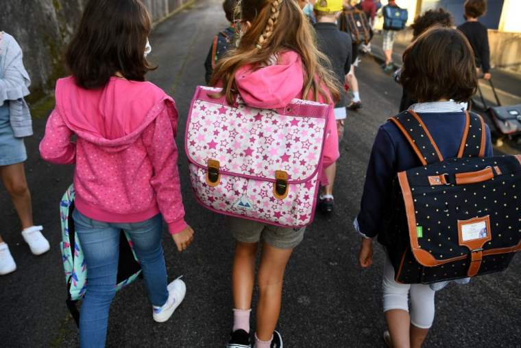 L'allocation de rentrée scolaire est versée mercredi 16 août aux familles. ( AFP / FRED TANNEAU )