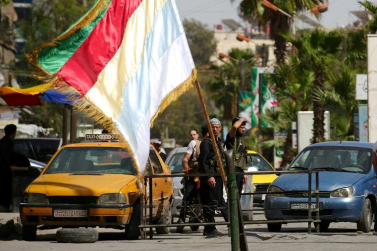Des membres des forces de sécurité druzes déployées à Jaramana, près de Damas, le 29 avril 2025 en Syrie ( AFP / Rami al SAYED )