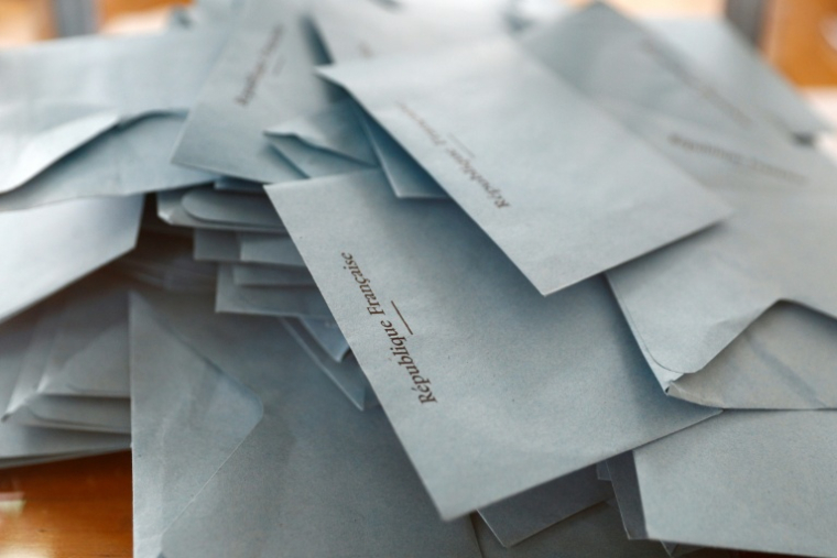 Lancés à l'assaut des municipales, le RN et LFI vont envoyer des députés en nombre aux élections de mars, en tablant sur leur notoriété pour s'implanter durablement dans les villes ( AFP / Sameer Al-DOUMY )