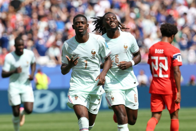 L'attaquant de la France Ousmane Dembélé (gauche) qui a marqué un triplé et le milieu Manu Koné contre la Norvège à Foxborough le 26 juin 2026 ( AFP / FRANCK FIFE )