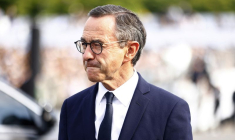 Le ministre de l'Intérieur Bruno Retailleau arrive au défilé militaire annuel lors des célébrations de la fête nationale à Paris