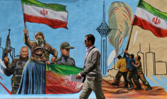 Un homme passe devant une fresque murale anti-Israël le 8 avril à Téhéran ( AFP / ATTA KENARE )