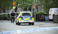 Des policiers bouclent les lieux d'une fusillade, dans le centre d'Uppsala, en Suède, le 29 avril 2025 ( TT NEWS AGENCY / Fredrik SANDBERG )