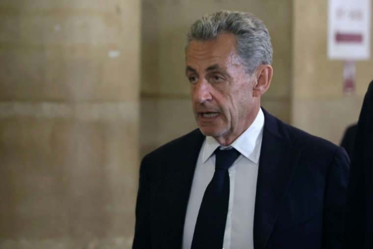 L'ancien président français Nicolas Sarkozy arrive au palais de justice de Paris, le 11 mai 2026, pour son procès en appel dans l'affaire du financement libyen de sa campagne présidentielle de 2007 ( AFP / Alain JOCARD )