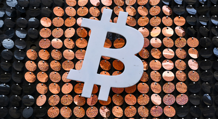 La cryptomonnaie continue son envol, pour combien de temps ? (© AFP)