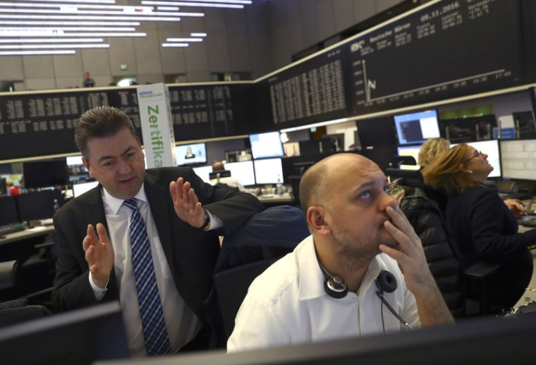 Des traders à la bourse de Francfort