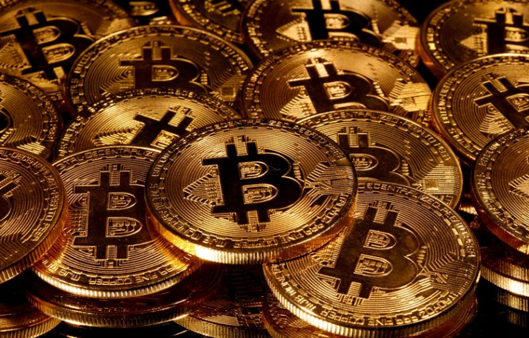 LE BITCOIN, À PLUS DE $18.000, SE RAPPROCHE DE SON RECORD