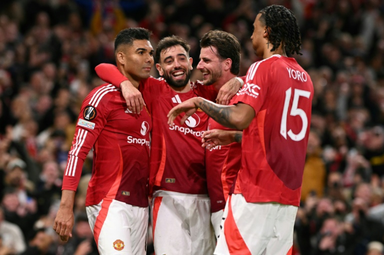 Les joueurs de Manchester United le 8 mai 2025 ( AFP / Oli SCARFF )