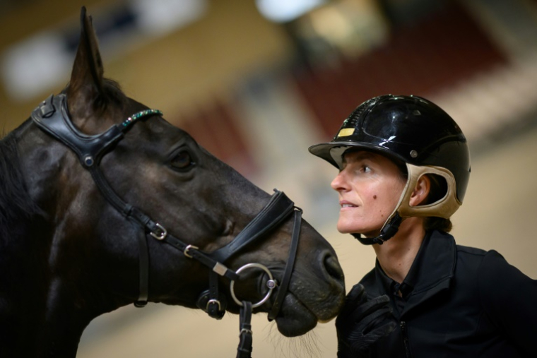 La cavalière française Pauline Basquin et son cheval Sertorius, le 5 juin 2025 à Saumur ( AFP / Loic VENANCE )