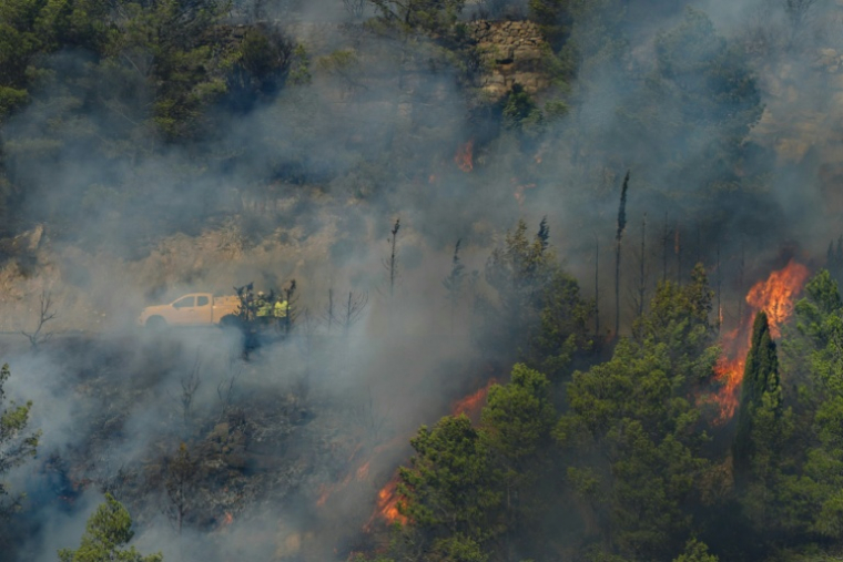 IUn véhicule de défense des forêts contre les incendies (DFCI) de l'Office national des forêts (ONF)sur le site d'un incendie dans le massif des Corbières à Ribaute, le 5 août 2026 dans l'Aude ( AFP / Idriss Bigou-Gilles )
