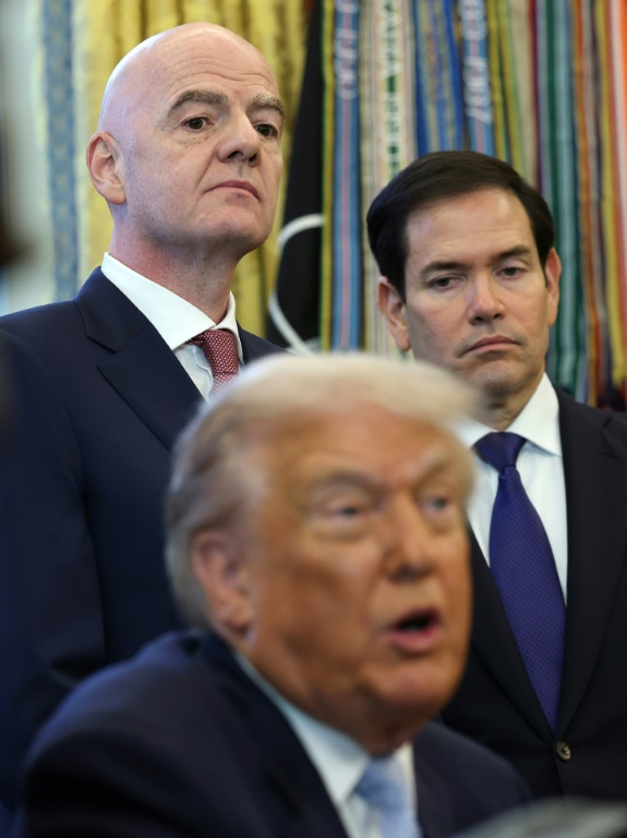 FIFA President Gianni Infantino (left) listens as US President Donald Trump speaks during a White House meeting last month ( GETTY IMAGES NORTH AMERICA / WIN MCNAMEE )