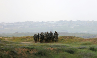 Des soldats israéliens près de la frontière avec la bande de Gaza, le 20 mars 2025 ( AFP / GIL COHEN-MAGEN )