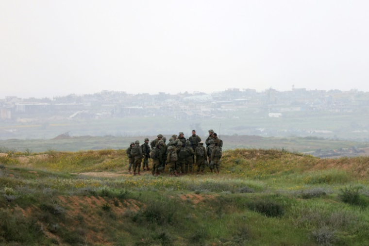 Des soldats israéliens près de la frontière avec la bande de Gaza, le 20 mars 2025 ( AFP / GIL COHEN-MAGEN )