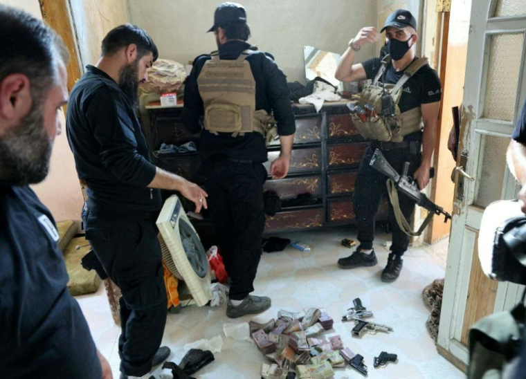 Photo diffusée par l'agence de presse officielle syrienne Sana, le 23 juin 2025, d'une opération de sécurité à Damas au lendemain d'un attentat-suicide contre une église orthodoxe ( SANA / - )