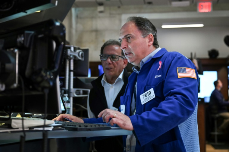 Des opérateurs à la Bourse de New York, le 15 juillet 2025 ( AFP / ANGELA WEISS )