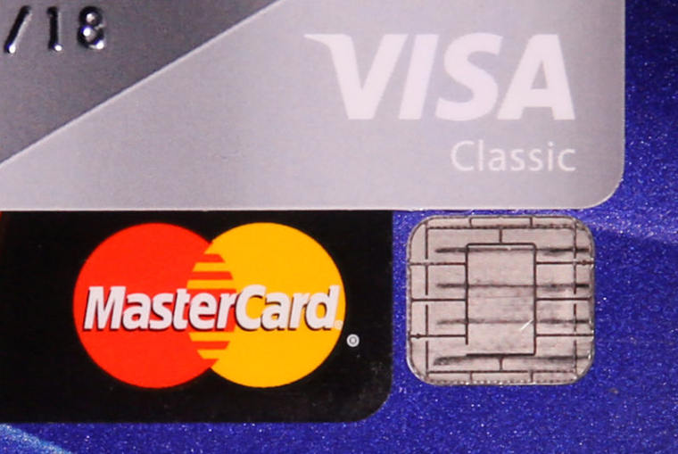 ACCORD À 6,2 MILLIARDS DE DOLLARS POUR VISA, MASTERCARD DANS UN DOSSIER D'ENTENTE