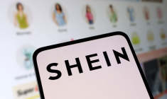 Illustration du logo de Shein et leur boutique en ligne sont visibles dans cette illustration