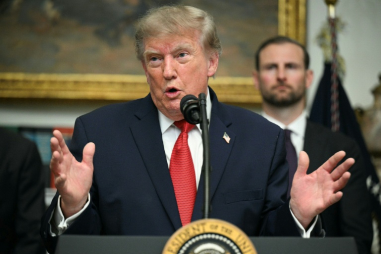Le président américain Donald Trump à la Maison Blanche, le 19 août 2026 à Washington ( AFP / Jim WATSON )