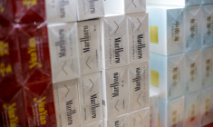 PHILIP MORRIS ET ALTRIA DISCUTENT FUSION