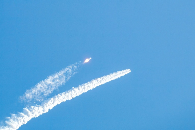 Le vaisseau spatial Mengzhou (d) se sépare de la fusée porteuse Longue Marche-10 lors d'un test d'interruption de lancement depuis le site de lancement spatial de Wenchang, dans la province de Hainan, le 11 février 2026 en Chine ( CNS / - )