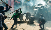 Affrontements entre policiers et manifestants le 29 août 2025 à Jakarta, en Indonésie ( AFP / YASUYOSHI CHIBA )