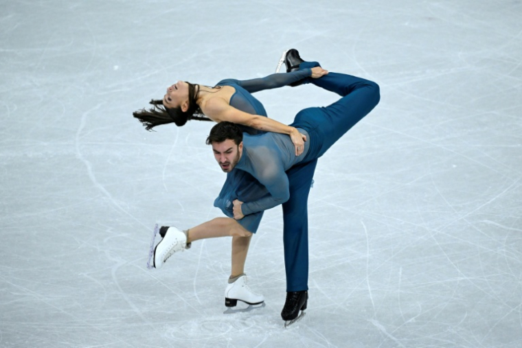Laurence Fournier Beaudry et Guillaume Cizeron médailles d'or en danse sur glace aux JO de Milan Cortina, le 11 février 2026 à Milan ( AFP / WANG Zhao )