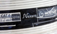 Un logo de Nexans est visible sur un câble F/UTP, lors du salon Rexel Expo, au parc des expositions de la Porte de Versailles