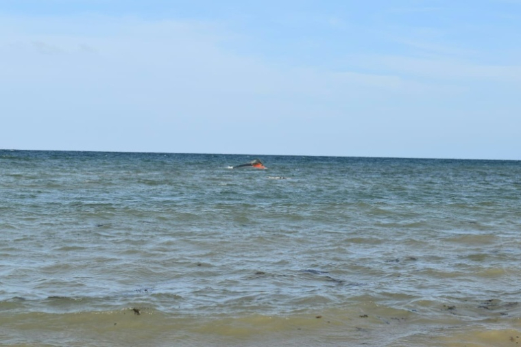 Photo fournie par l’Organisation internationale pour les migrations (OIM) le 11 octobre 2026, montrant l’épave d’un bateau de migrants qui a coulé au large de Djibouti dans la nuit du 8 au 9 octobre ( IOM / Handout )