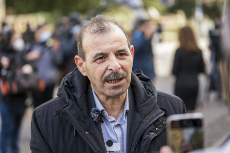L'avocat syrien spécialisé dans la défense des droits humains, Anwar al-Bunni, s'adresse aux médias à Coblence, dans l'ouest de l'Allemagne, le 24 février 2021  ( AFP / Thomas Lohnes )