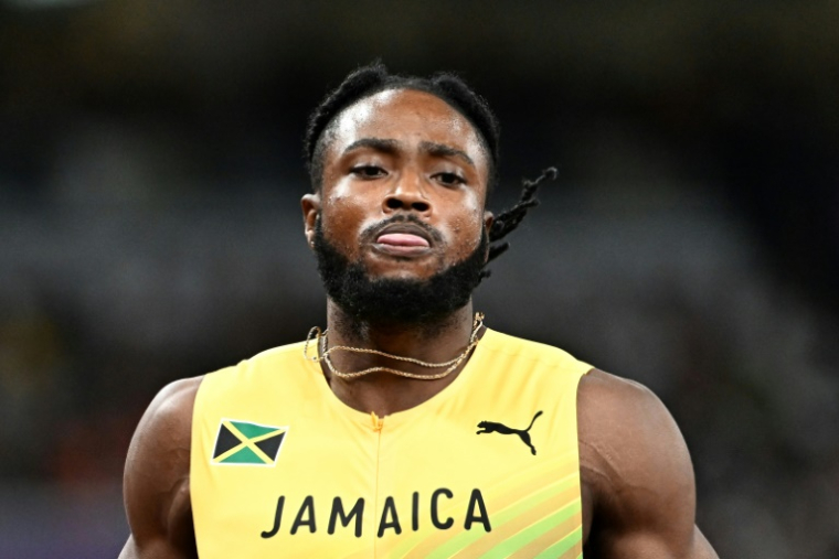 Le sprinteur jamaïcain Kishane Thompson lors des séries du 100 m aux Mondiaux de Tokyo, le 13 septembre 2025 ( AFP / Jewel SAMAD )