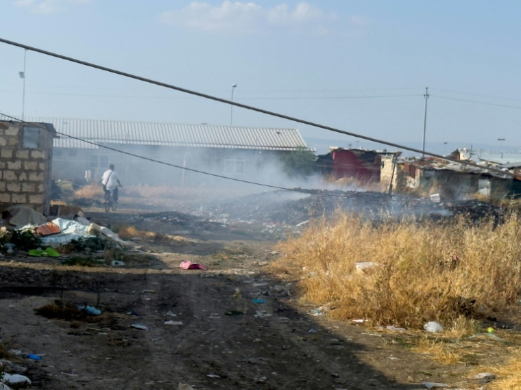 The shanty town on the outskirts of Foggia has existed since 2005. ( AFP / Tiziana FABI )