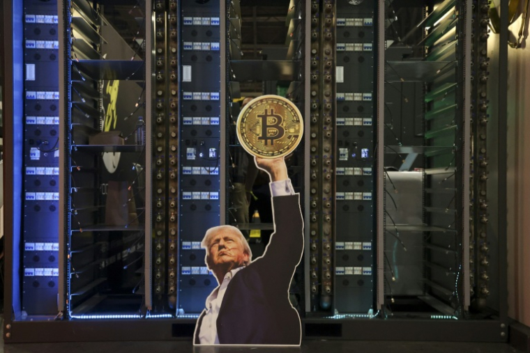 Le visage de Donald Trump sur un serveur lors d'une conférence Bitcoin à Las Vegas aux Etats-Unis, le 27 mai 2025 ( AFP / Ian Maule )