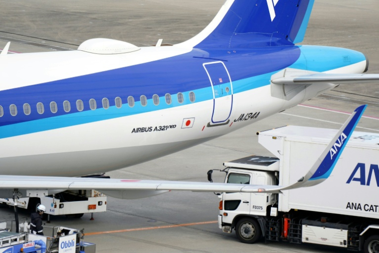 Un Airbus 321 neo de la compagnie All Nippon Airways (ANA) sur le tarmac de l'aéroport Haneda de Tokyo, le 29 novembre 2025 ( AFP / Kazuhiro NOGI )