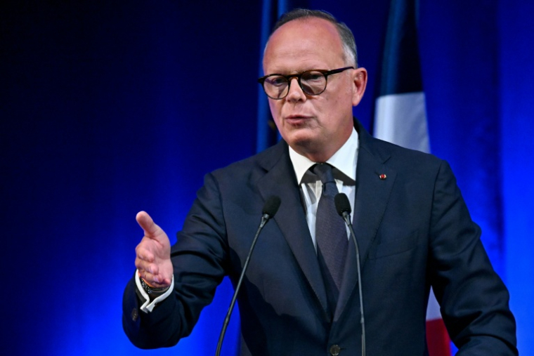Édouard Philippe, président du parti Horizons, maire du Havre et candidat à l'élection présidentielle de 2027, lors d'un meeting à Reims, le 10 mai 2026 ( AFP / Martin BUREAU )