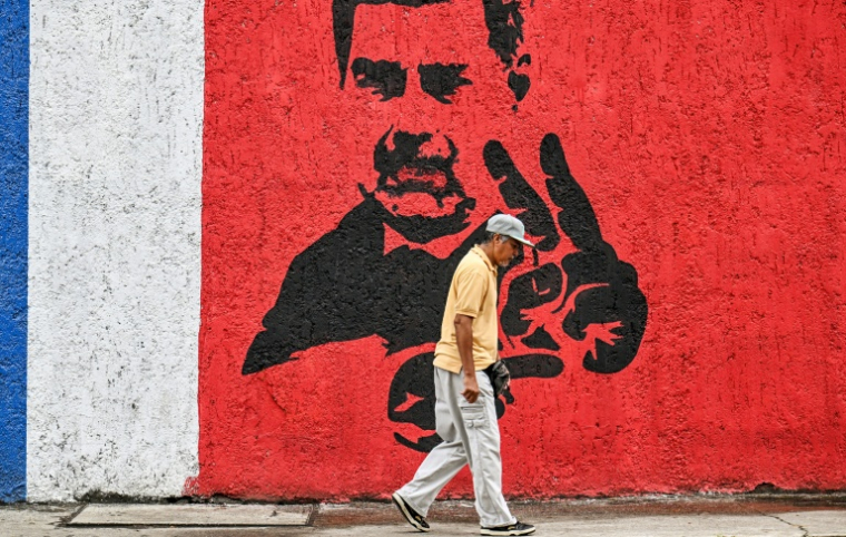 Une fresque murale à Caracas représente le président vénézuélien déchu Nicolas Maduro, le 10 janvier 2026 ( AFP / Juan BARRETO )