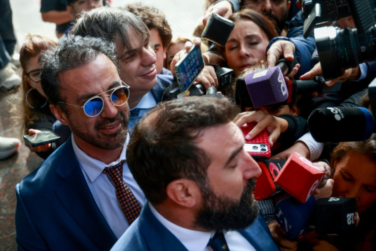 Argentine football legend Diego Maradona's former medical doctor Leopoldo Luque arrives at courthouse for a preliminary hearing in a trial over his death in San Isidro, outskirts of Buenos Aires on April 14, 2026. ( AFP / Tomas CUESTA )