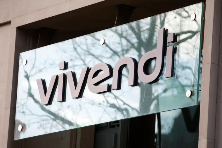 VIVENDI VEUT DISTRIBUER 60% DU CAPITAL D'UMG, L'ACTION BONDIT