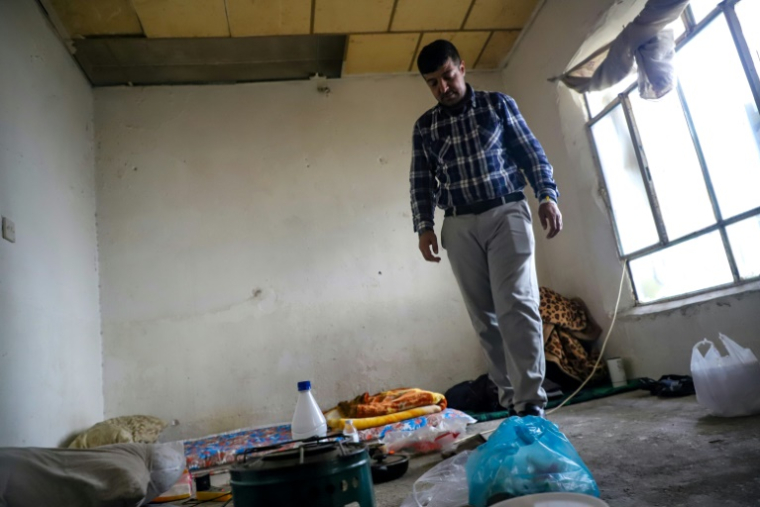 Mohamed Jalel, un Irakien expulsé d'Allemagne, dans son appartement à Ranya dans le nord de l'Irak, le 19 mars 2025 ( AFP / Shwan MOHAMMED )