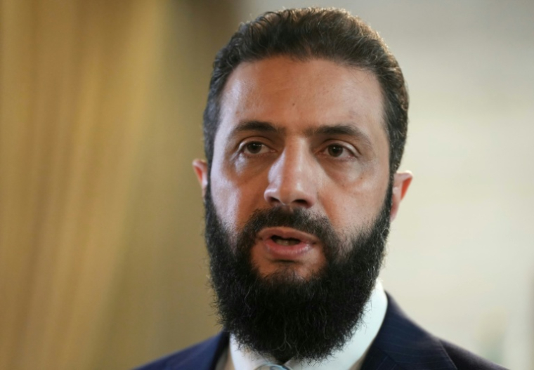 Le président syrien Ahmed al-Chareh, le 18 janvier 2026 au palais présidentiel de Damas ( AFP / Rami al SAYED )