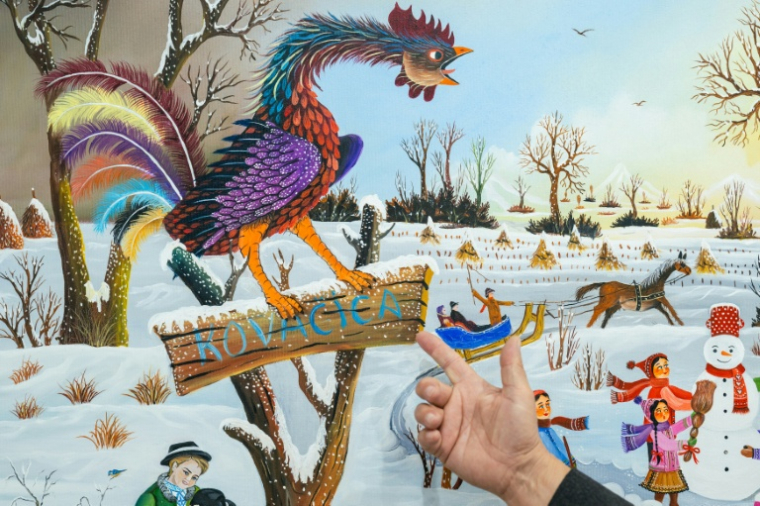 Détail d'une peinture d'art naïf exposée dans une galerie à Kovačica, dans le nord de la Serbie le 16 octobre 2025 ( AFP / Andrej ISAKOVIC )