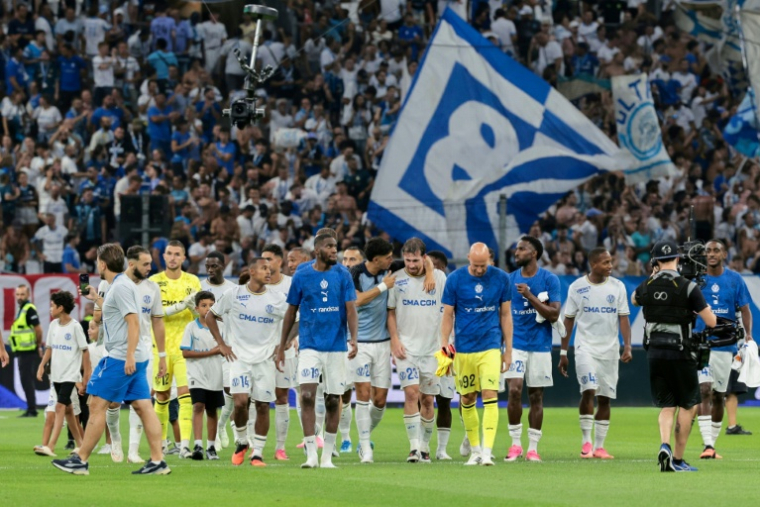 Les Marseillais, vainqueurs de Strasbourg en ouverture du championnat, le 21 août 2026 au stade Vélodrome, ont eu un tirage corsé pour la Ligue Europa ( AFP / Pascal POCHARD-CASABIANCA )