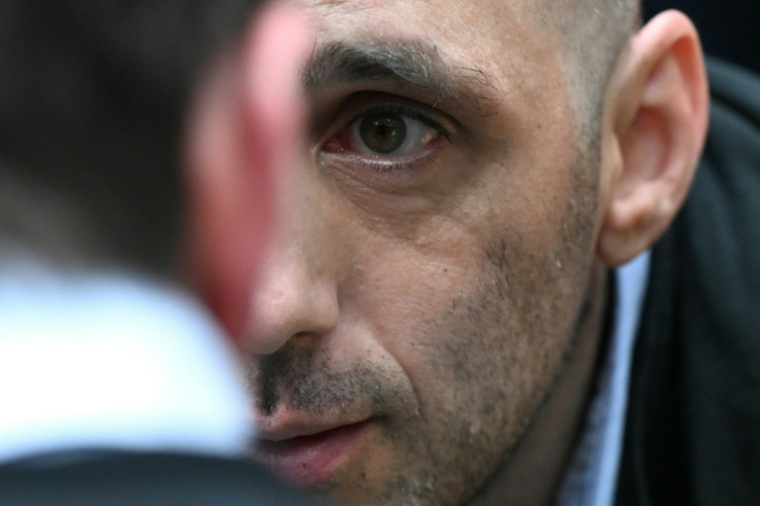 Cédric Jubillar au procès du meurtre de son épouse Delphine, le 23 septembre 2025 à la cour d'assises du Tarn, à Albi ( AFP / Lionel BONAVENTURE )