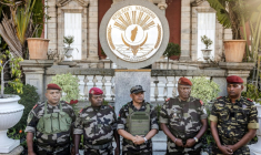 Colonel Michael Randrianirina (C) has pledged to lead the impoverished Indian Ocean island to civilian leadership in under two years ( AFP / Luis TATO )