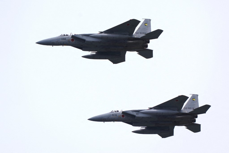 Des chasseurs F-15 de la force d'auto-défense japonaise, en avril 2026 (illustration) ( AFP / KAZUHIRO NOGI )