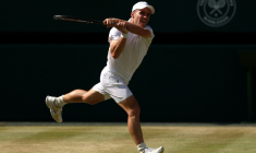 Le Britannique Arthur Féry en quarts de finale de Wimbledon contre l'Italien Flavio Cobolli le 8 juillet 2026 à Londres ( AFP / Adrian Dennis )