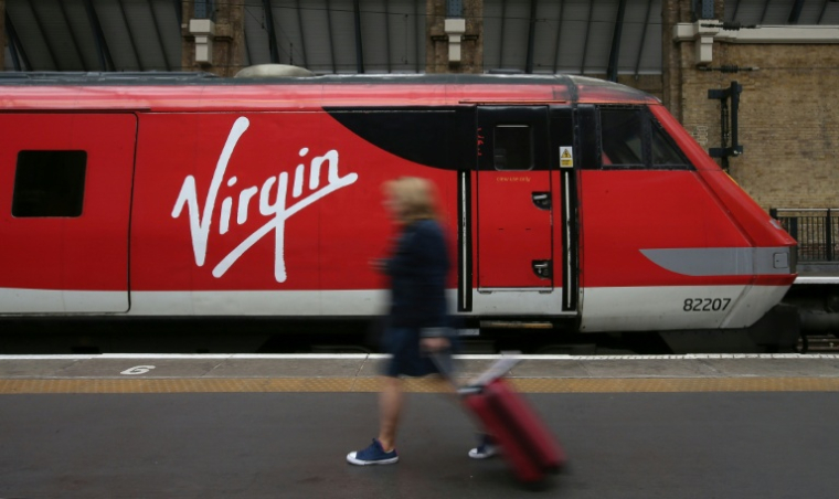Un train exploité par Virgin Trains à la gare de Londres-King's Cross, le 16 mai 2018 ( AFP / Daniel LEAL )