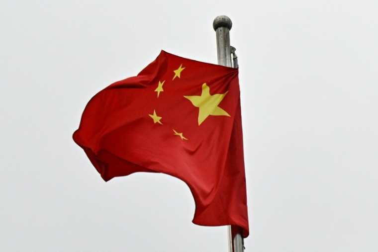 Un drapeau chinois flotte à Pékin, en Chine, le 4 mars 2026 ( AFP / Pedro PARDO )