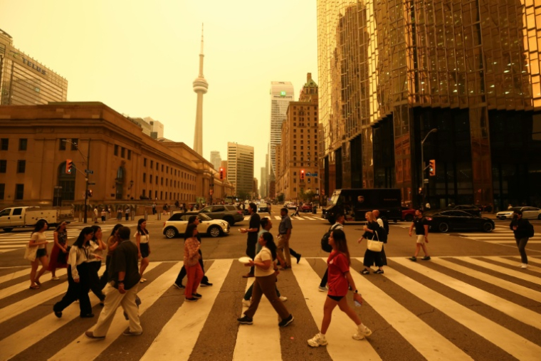 Dans les rues de Toronto le 15 juillet 2026 ( AFP / Cole BURSTON )
