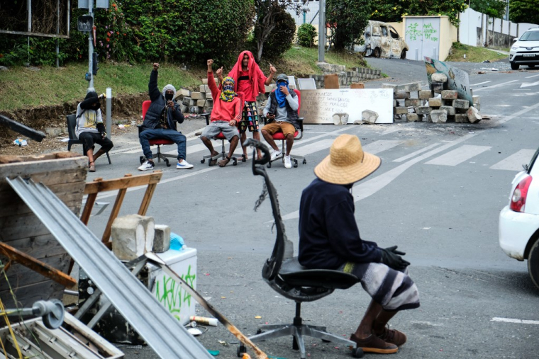 Des indépendantistes à Nouméa, le 22 mai 2024. ( AFP / THEO ROUBY )